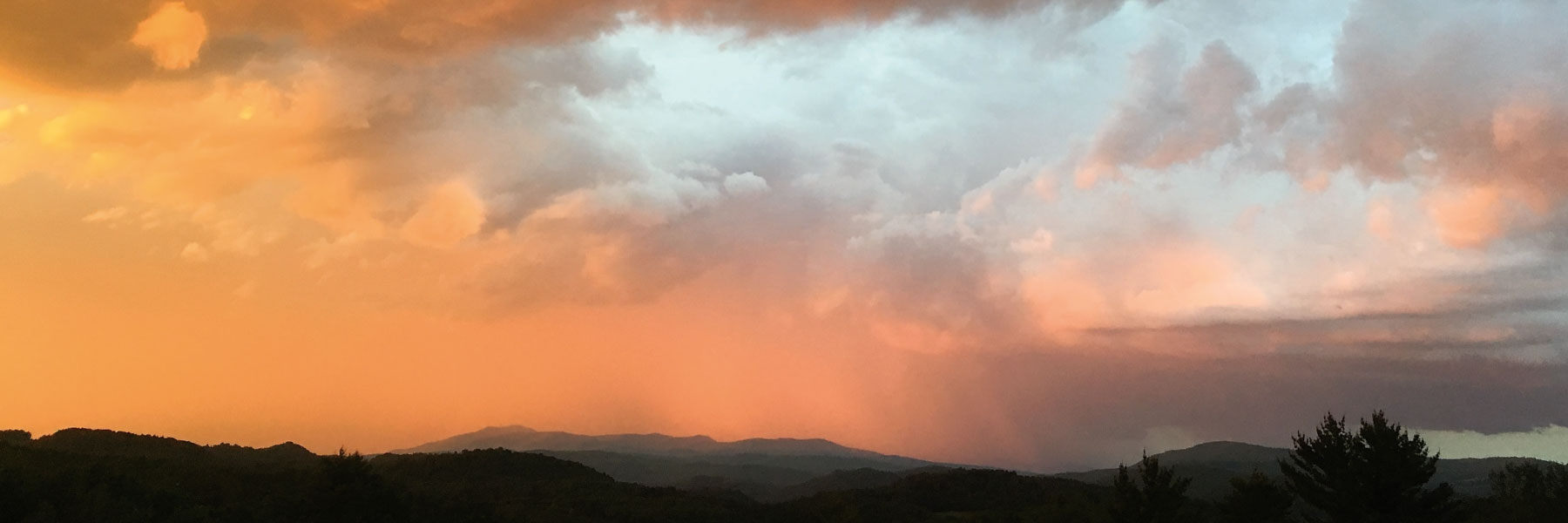 Storm clouds over Burke Mountain, Northview Weather